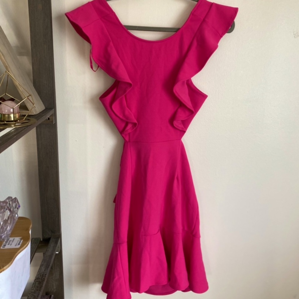 Apron style dress, never worn! Hi low flouncey hem